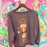 Brown Espresso Martini Serving Nutcracker SweatshirtQueen of SparklesThe Printed Peach Savannah
