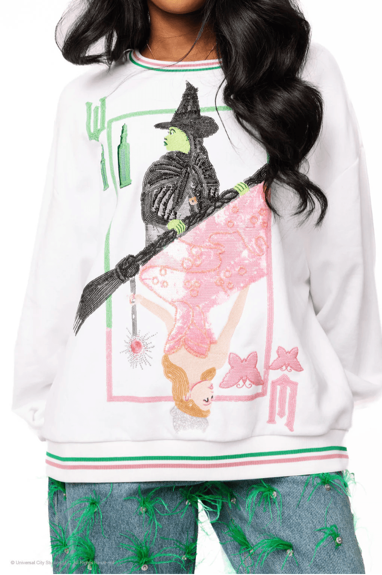 Licensed Elphaba & Glinda Card SweatshirtWomens - Tops - Sweatshirts & PopoversQueen of SparklesThe Printed Peach Savannah