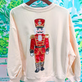 Beige & Red Metallic Nutcracker Soldier SweatshirtLILLY PULITZERThe Printed Peach Savannah