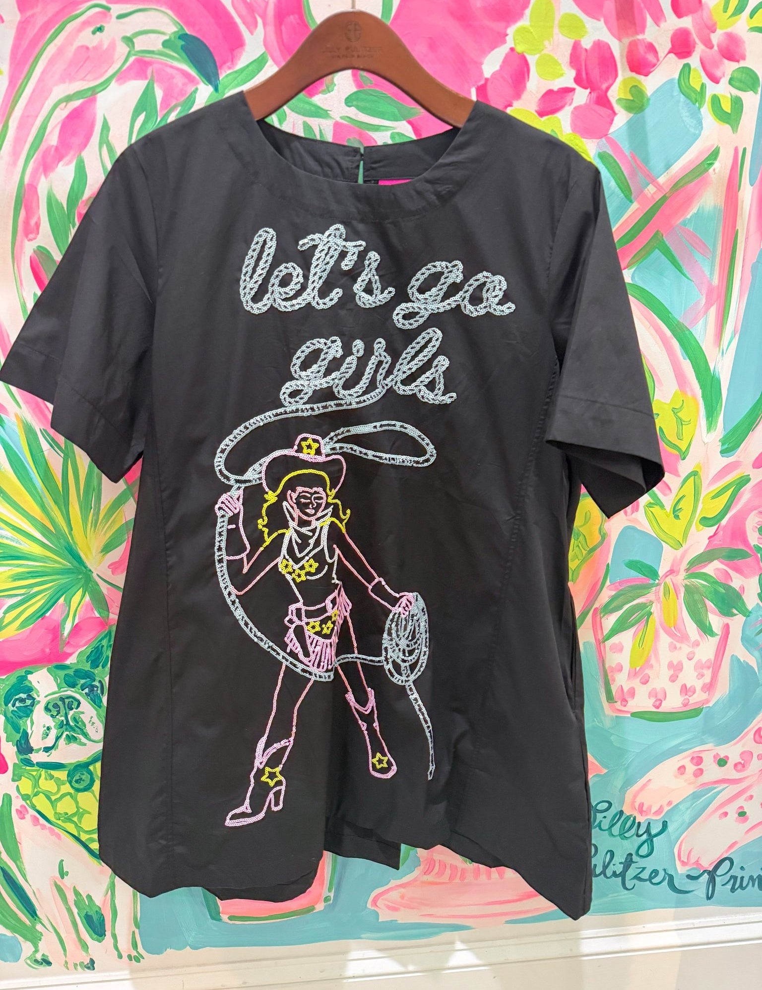 Black 'Let's Go Girls' Lassoing Cowgirl Cotton DressQueen of SparklesThe Printed Peach Savannah