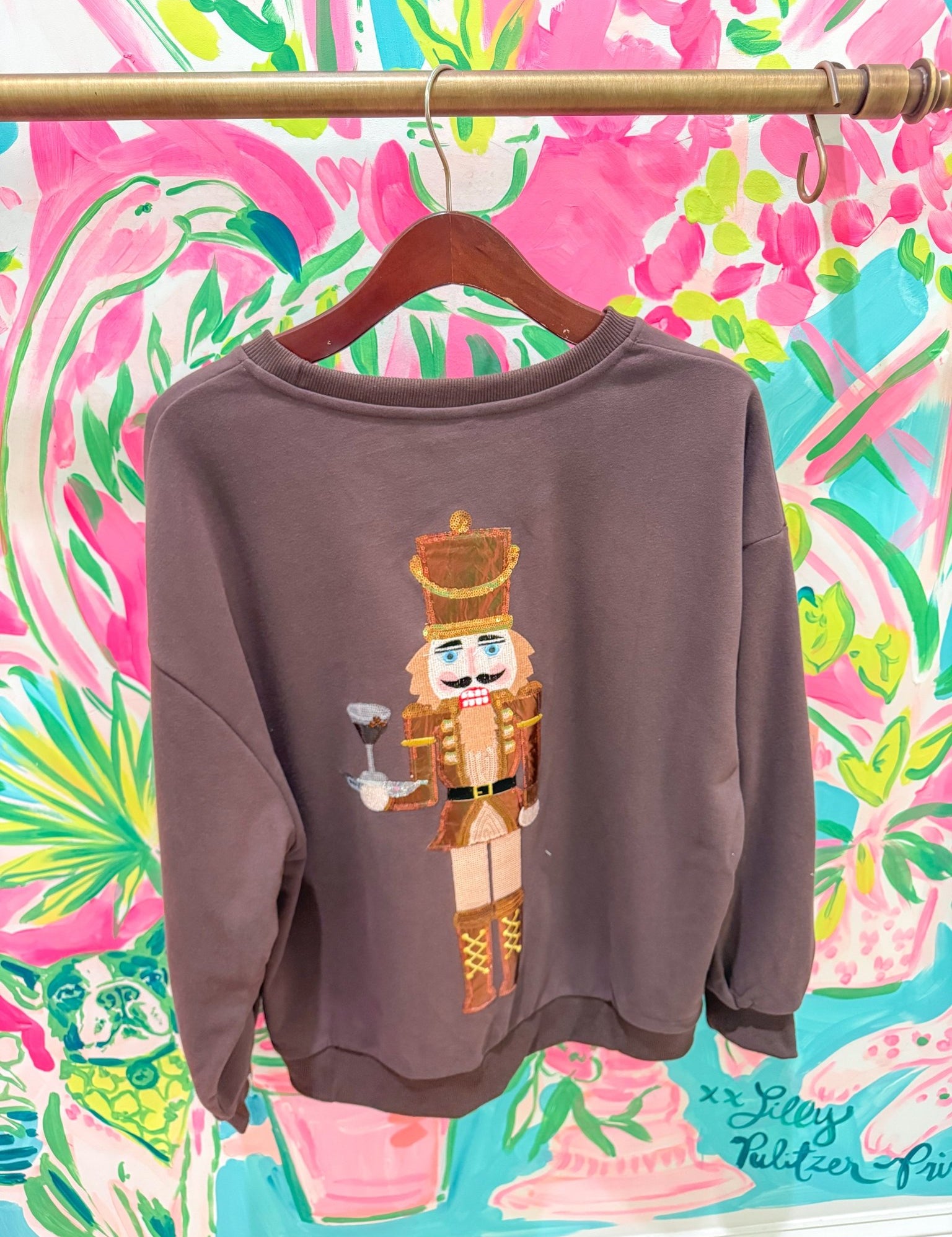 Brown Espresso Martini Serving Nutcracker SweatshirtQueen of SparklesThe Printed Peach Savannah