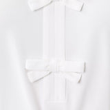 Frida Sleeveless Bow Polo UPF 50+Women - Active - Active Tops - PolosLILLY PULITZERThe Printed Peach Savannah