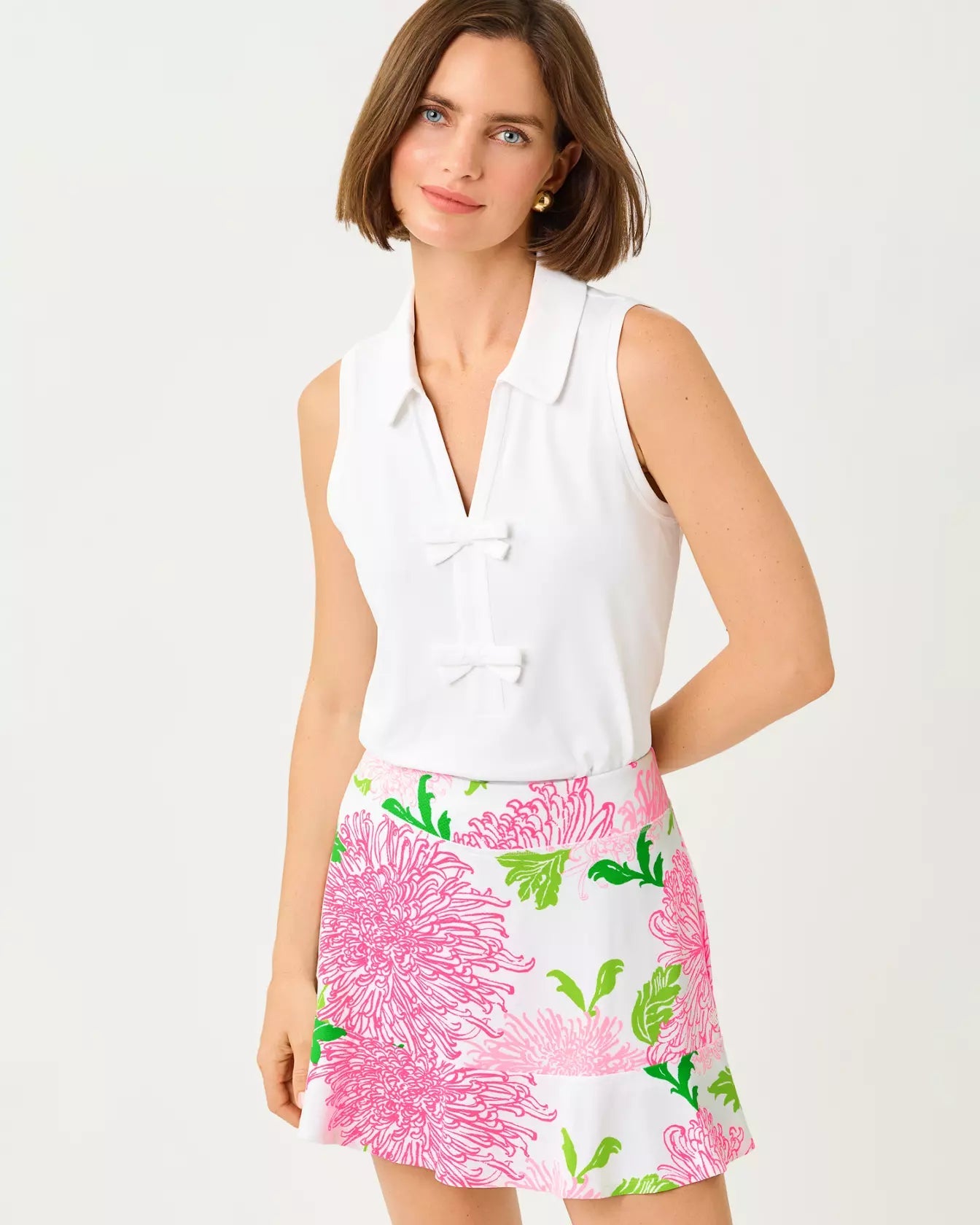 Frida Sleeveless Bow Polo UPF 50+Women - Active - Active Tops - PolosLILLY PULITZERThe Printed Peach Savannah