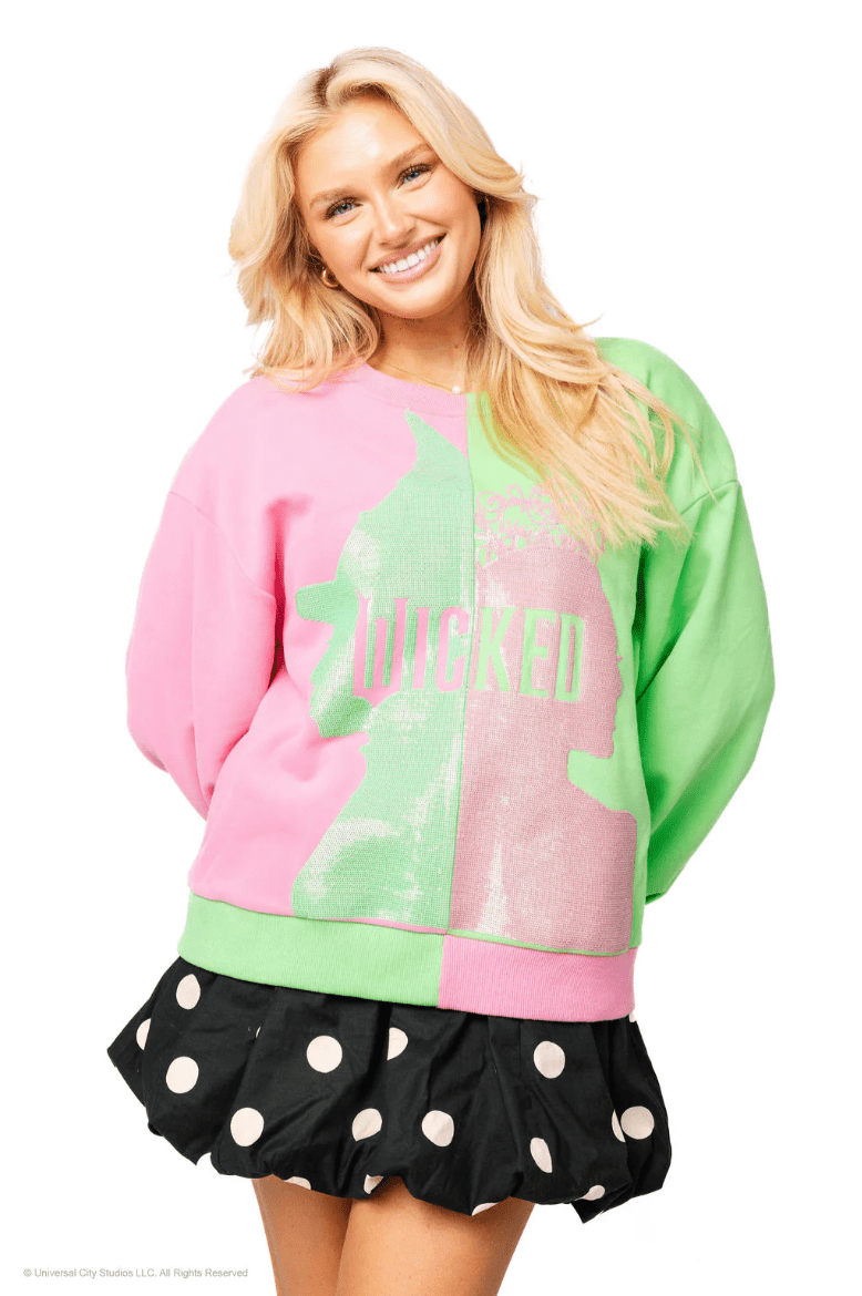 Licensed Green & Pink Colorblock Character Profile 'Wicked' SweatshirtWomens - Tops - Sweatshirts & PopoversQueen of SparklesThe Printed Peach Savannah