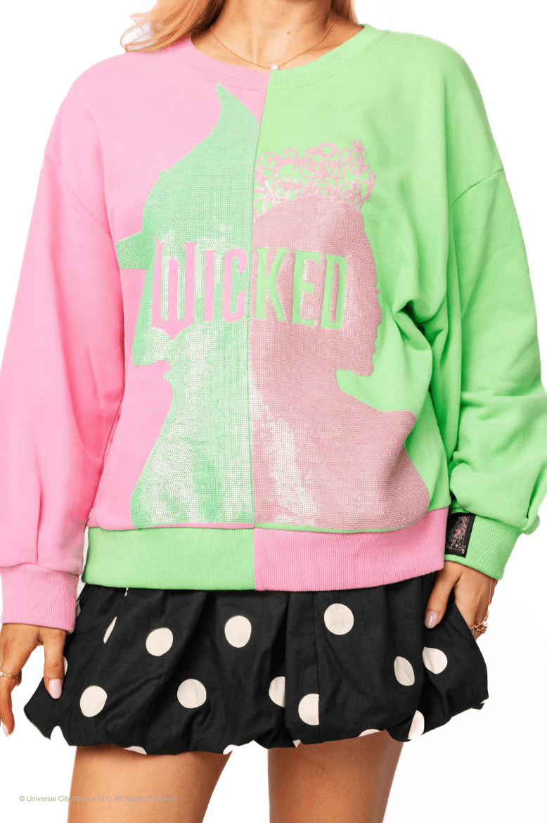 Licensed Green & Pink Colorblock Character Profile 'Wicked' SweatshirtWomens - Tops - Sweatshirts & PopoversQueen of SparklesThe Printed Peach Savannah