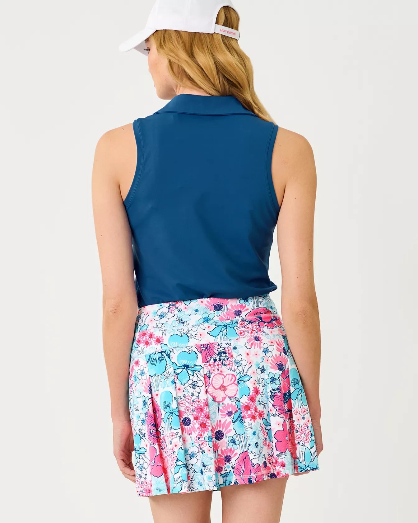UPF 50+ Luxletic Frida Sleeveless Bow PoloWomen - Active - Active Tops - PolosLILLY PULITZERThe Printed Peach Savannah