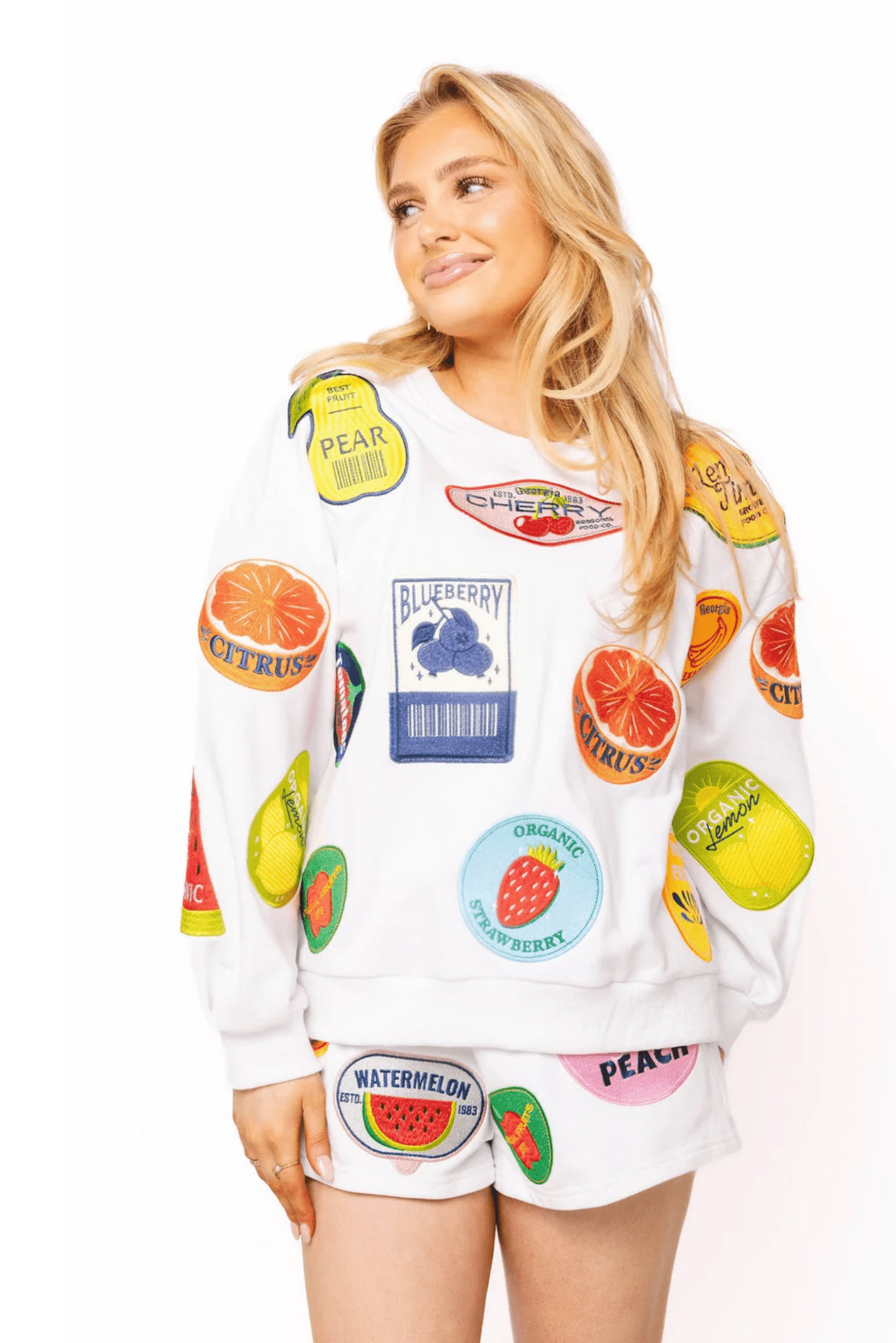 White Multi Fruit Sticker SweatshirtWomen - Tops - Sweatshirts & PopoversQueen of SparklesThe Printed Peach Savannah