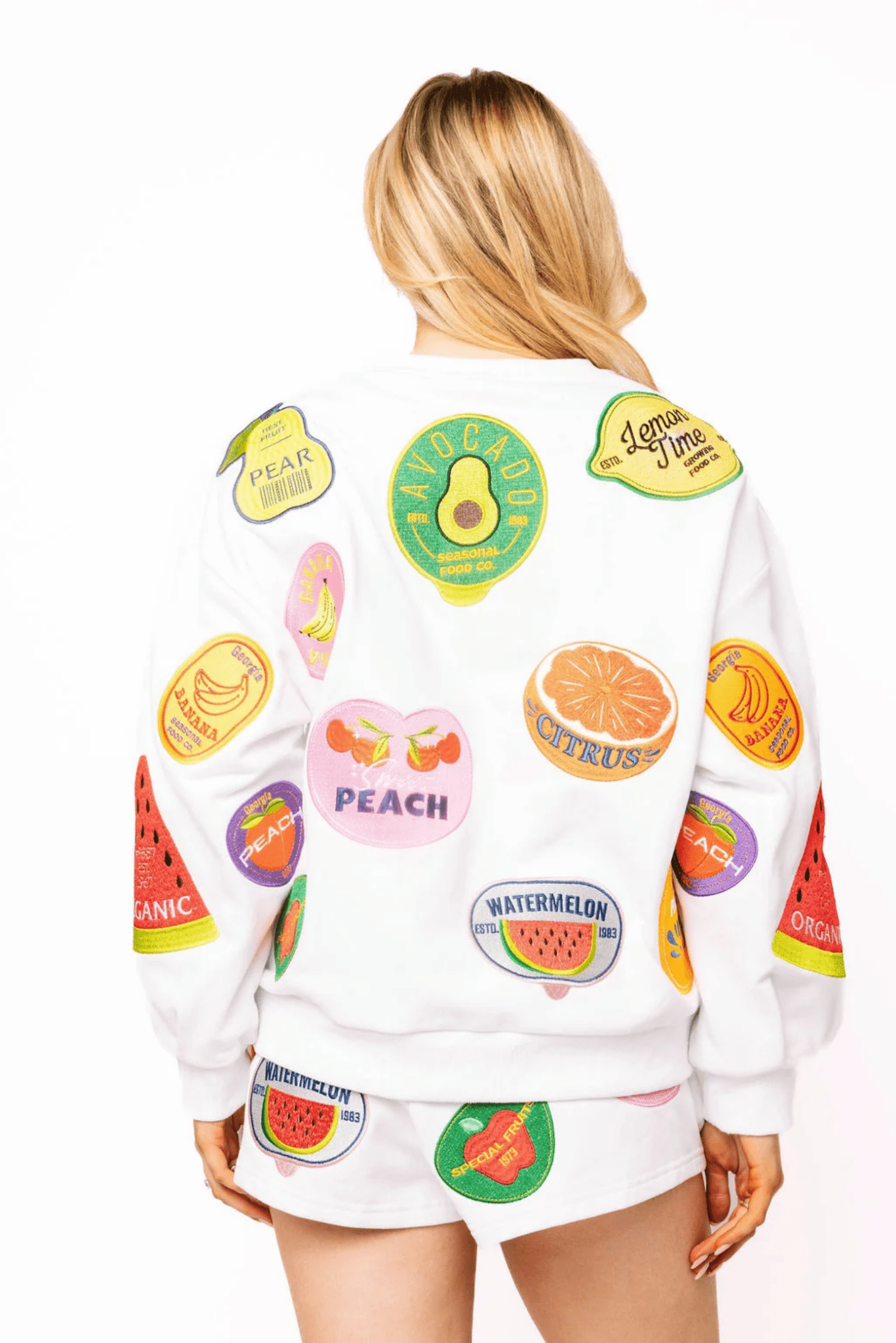 White Multi Fruit Sticker SweatshirtWomen - Tops - Sweatshirts & PopoversQueen of SparklesThe Printed Peach Savannah