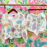 White Outline Rainbow Under The Sea Icon ShortQueen of SparklesThe Printed Peach Savannah