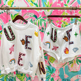 White 'Queen' Icon ShortQueen of SparklesThe Printed Peach Savannah